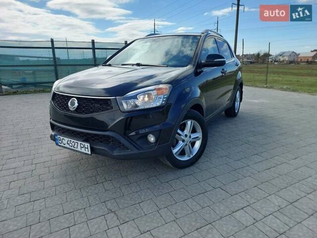 Черный Cанг Йонг Корандо, объемом двигателя 2 л и пробегом 163 тыс. км за 10599 $, фото 10 на Automoto.ua