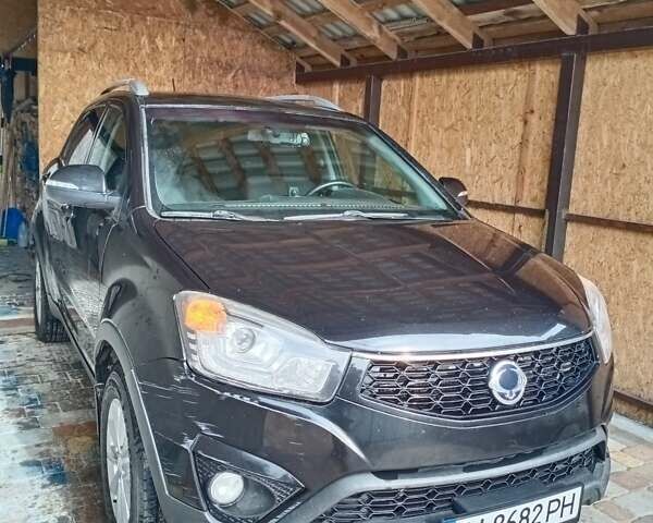 Чорний Cанг Йонг Korando, об'ємом двигуна 2 л та пробігом 170 тис. км за 10400 $, фото 53 на Automoto.ua