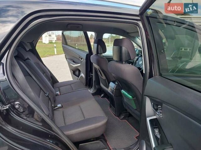 Черный Cанг Йонг Корандо, объемом двигателя 2 л и пробегом 163 тыс. км за 10599 $, фото 18 на Automoto.ua