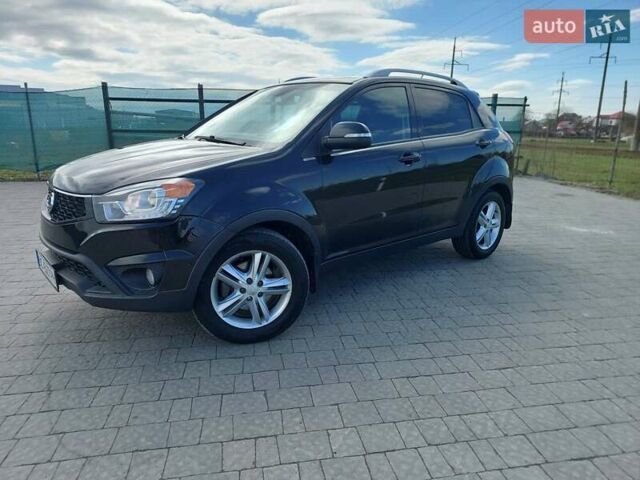 Черный Cанг Йонг Корандо, объемом двигателя 2 л и пробегом 163 тыс. км за 10599 $, фото 9 на Automoto.ua