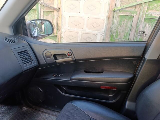 Коричневий Cанг Йонг Korando, об'ємом двигуна 2 л та пробігом 325 тис. км за 5100 $, фото 9 на Automoto.ua