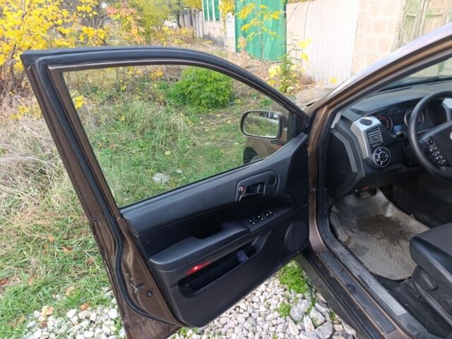 Коричневий Cанг Йонг Korando, об'ємом двигуна 2 л та пробігом 325 тис. км за 5100 $, фото 5 на Automoto.ua