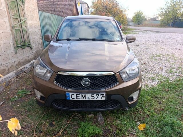 Коричневий Cанг Йонг Korando, об'ємом двигуна 2 л та пробігом 325 тис. км за 5100 $, фото 3 на Automoto.ua