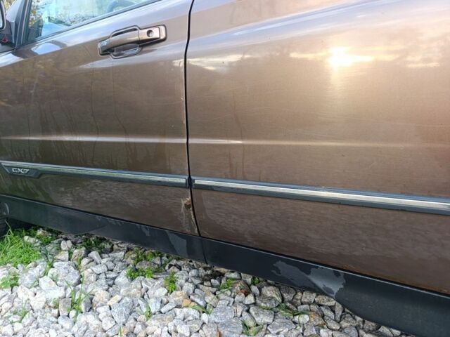 Коричневий Cанг Йонг Korando, об'ємом двигуна 2 л та пробігом 325 тис. км за 5100 $, фото 2 на Automoto.ua