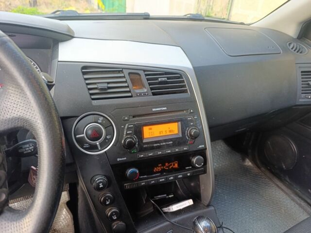 Коричневий Cанг Йонг Korando, об'ємом двигуна 2 л та пробігом 325 тис. км за 5100 $, фото 11 на Automoto.ua