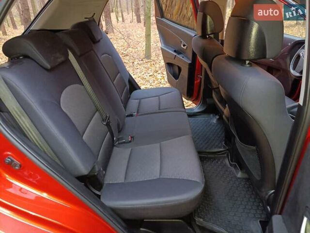 Cанг Йонг Korando 2012 у Житомирі на Automoto.ua Червоний Cанг Йонг Korando, об'ємом двигуна 2 л та пробігом 227 тис. км за 8000 $, фото 10 на Automoto.ua