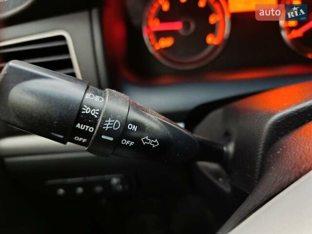 Cанг Йонг Korando 2012 у Житомирі на Automoto.ua Червоний Cанг Йонг Korando, об'ємом двигуна 2 л та пробігом 227 тис. км за 8000 $, фото 3 на Automoto.ua