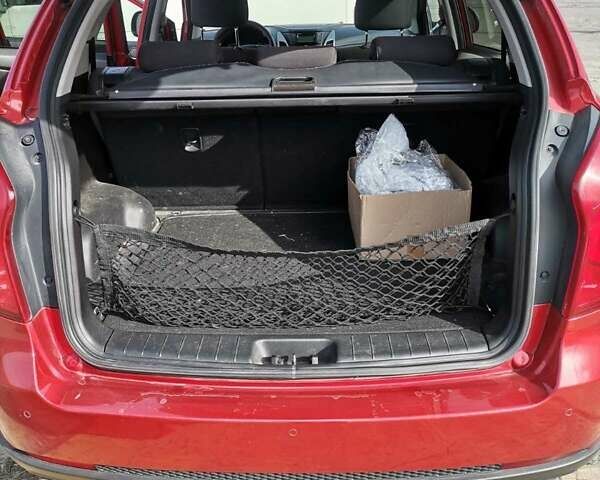 Червоний Cанг Йонг Korando, об'ємом двигуна 2 л та пробігом 100 тис. км за 10000 $, фото 6 на Automoto.ua