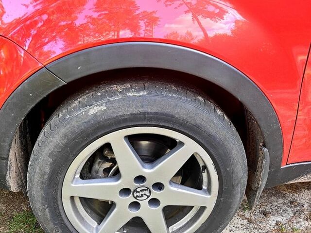 Красный Cанг Йонг Корандо, объемом двигателя 2 л и пробегом 206 тыс. км за 9000 $, фото 4 на Automoto.ua