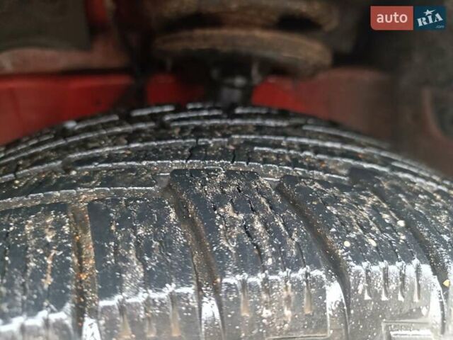 Красный Cанг Йонг Корандо, объемом двигателя 2 л и пробегом 156 тыс. км за 9000 $, фото 14 на Automoto.ua