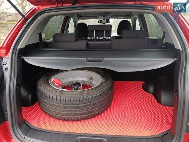 Красный Cанг Йонг Корандо, объемом двигателя 2 л и пробегом 156 тыс. км за 9000 $, фото 11 на Automoto.ua