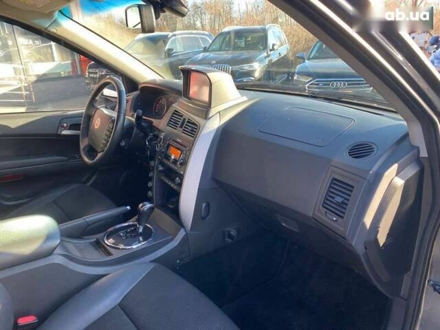 Cанг Йонг Korando, об'ємом двигуна 2 л та пробігом 235 тис. км за 9900 $, фото 8 на Automoto.ua