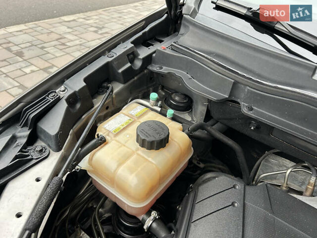 Сірий Cанг Йонг Korando, об'ємом двигуна 2 л та пробігом 171 тис. км за 9999 $, фото 31 на Automoto.ua