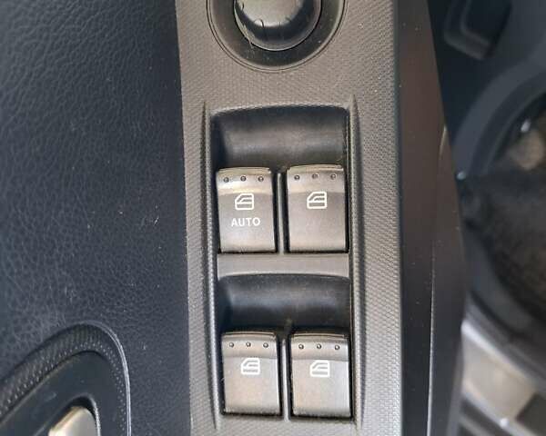 Сірий Cанг Йонг Korando, об'ємом двигуна 2 л та пробігом 180 тис. км за 9300 $, фото 27 на Automoto.ua