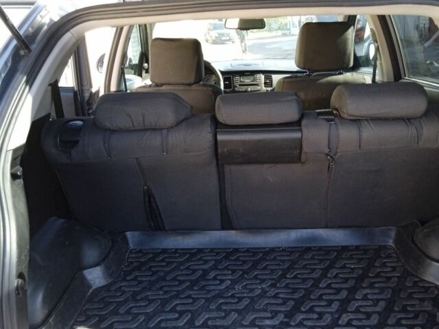 Серый Cанг Йонг Корандо, объемом двигателя 2 л и пробегом 182 тыс. км за 8500 $, фото 6 на Automoto.ua