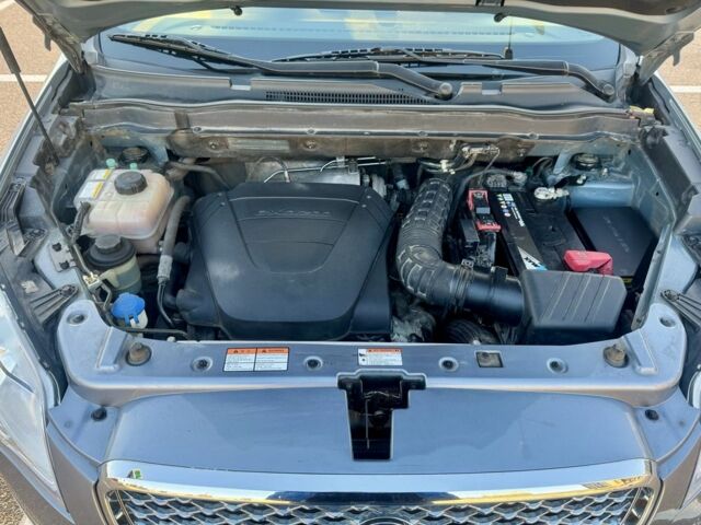 Серый Cанг Йонг Корандо, объемом двигателя 2 л и пробегом 134 тыс. км за 9600 $, фото 7 на Automoto.ua