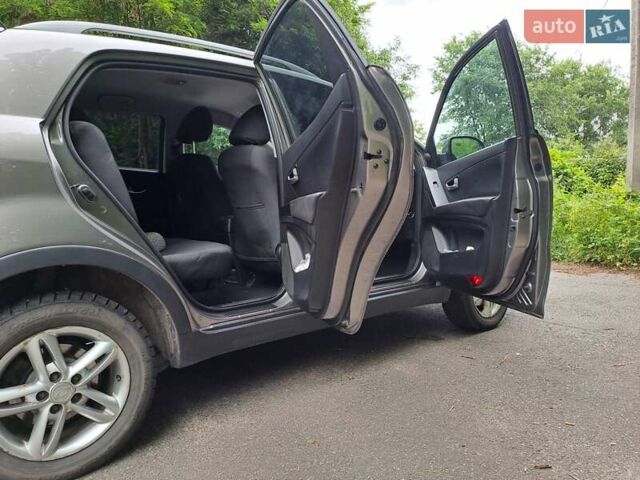 Сірий Cанг Йонг Korando, об'ємом двигуна 2 л та пробігом 135 тис. км за 9000 $, фото 5 на Automoto.ua