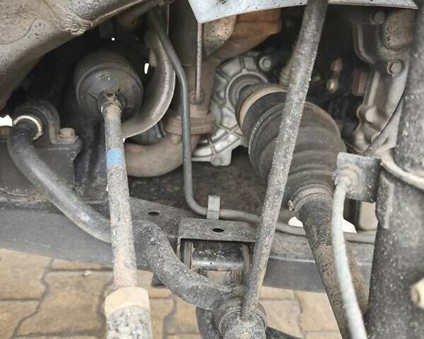 Сірий Cанг Йонг Korando, об'ємом двигуна 2 л та пробігом 165 тис. км за 10000 $, фото 15 на Automoto.ua