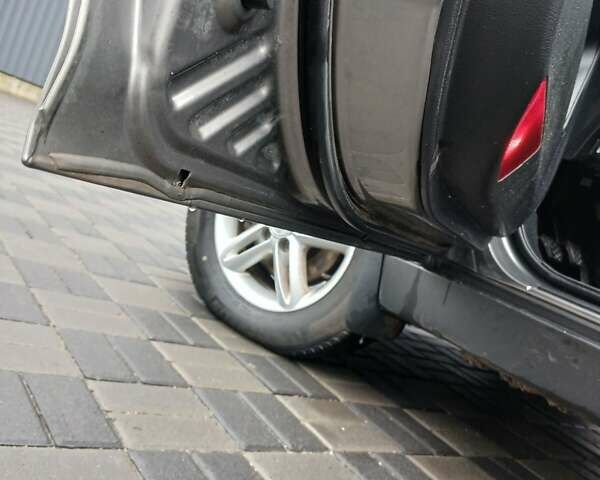 Серый Cанг Йонг Корандо, объемом двигателя 2 л и пробегом 204 тыс. км за 8200 $, фото 6 на Automoto.ua