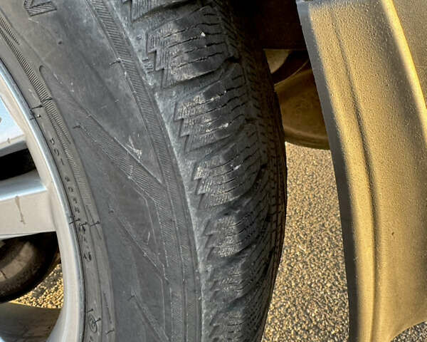 Серый Cанг Йонг Корандо, объемом двигателя 2 л и пробегом 134 тыс. км за 8999 $, фото 6 на Automoto.ua