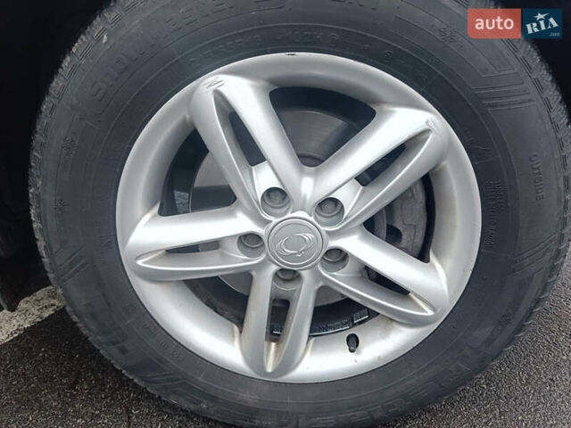 Серый Cанг Йонг Корандо, объемом двигателя 2 л и пробегом 144 тыс. км за 8000 $, фото 21 на Automoto.ua