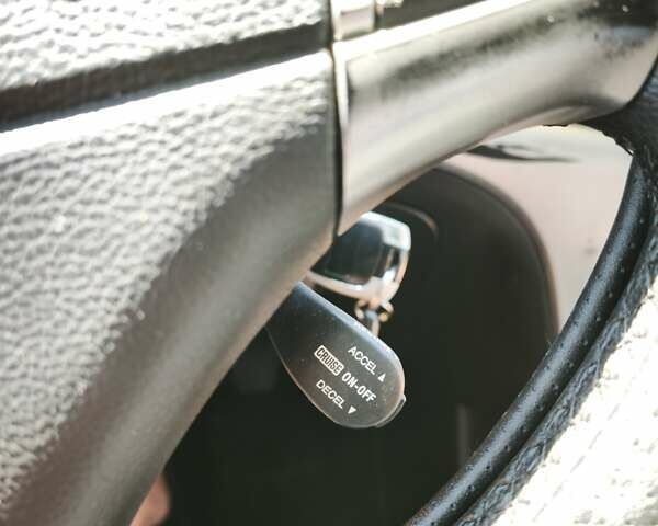 Сірий Cанг Йонг Korando, об'ємом двигуна 2 л та пробігом 165 тис. км за 10000 $, фото 2 на Automoto.ua