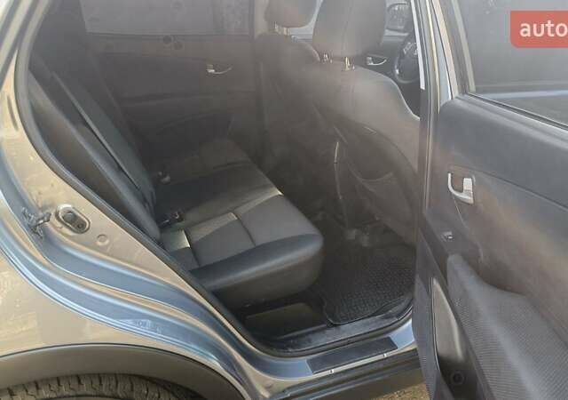 Серый Cанг Йонг Корандо, объемом двигателя 2 л и пробегом 130 тыс. км за 10000 $, фото 6 на Automoto.ua