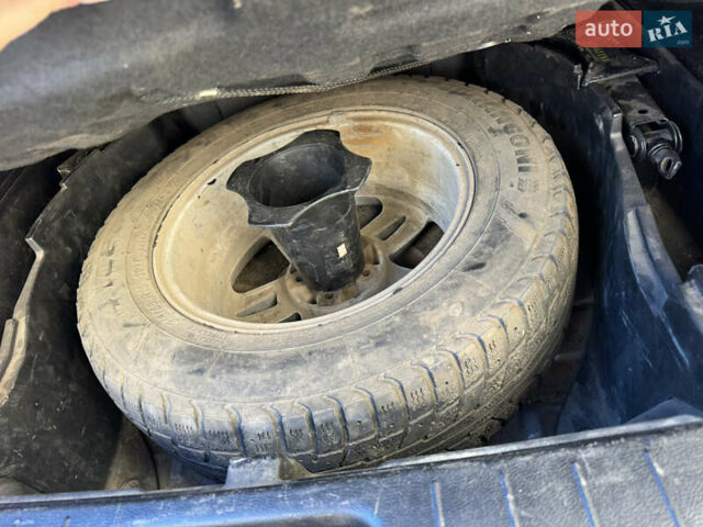 Серый Cанг Йонг Корандо, объемом двигателя 2 л и пробегом 163 тыс. км за 8000 $, фото 32 на Automoto.ua