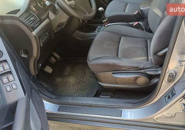 Серый Cанг Йонг Корандо, объемом двигателя 2 л и пробегом 130 тыс. км за 10000 $, фото 1 на Automoto.ua