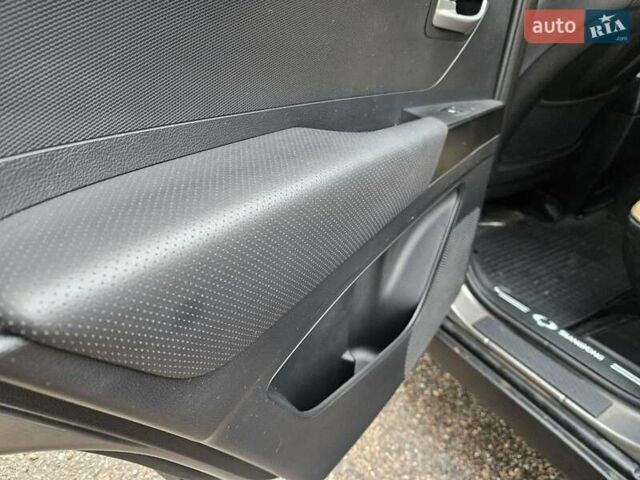 Сірий Cанг Йонг Korando, об'ємом двигуна 2 л та пробігом 168 тис. км за 7900 $, фото 8 на Automoto.ua