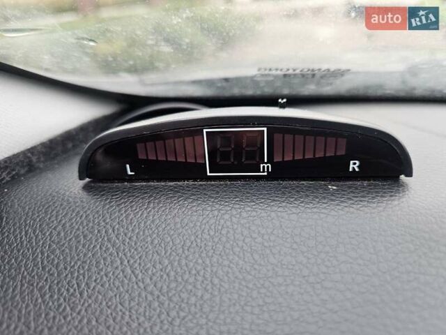 Сірий Cанг Йонг Korando, об'ємом двигуна 2 л та пробігом 168 тис. км за 7900 $, фото 13 на Automoto.ua