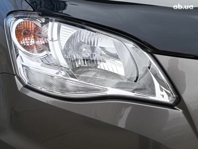 Сірий Cанг Йонг Korando, об'ємом двигуна 2 л та пробігом 130 тис. км за 10590 $, фото 3 на Automoto.ua