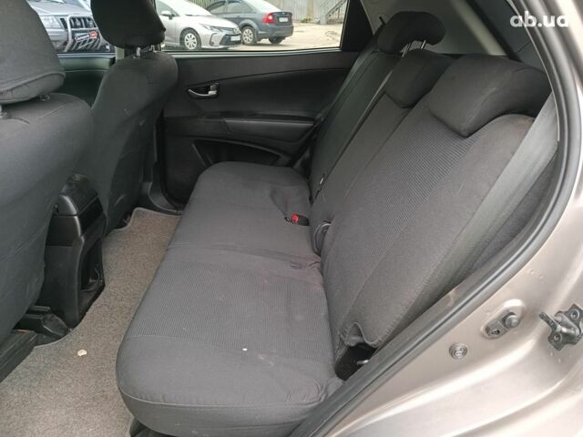 Сірий Cанг Йонг Korando, об'ємом двигуна 2 л та пробігом 130 тис. км за 10590 $, фото 11 на Automoto.ua