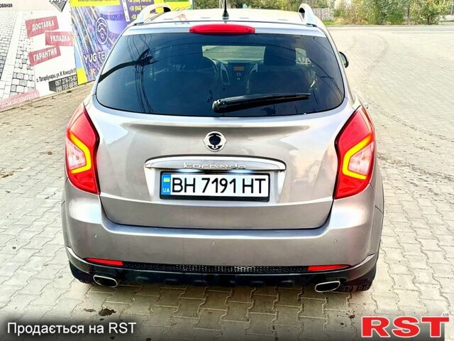 Сірий Cанг Йонг Korando, об'ємом двигуна 2 л та пробігом 130 тис. км за 9999 $, фото 4 на Automoto.ua