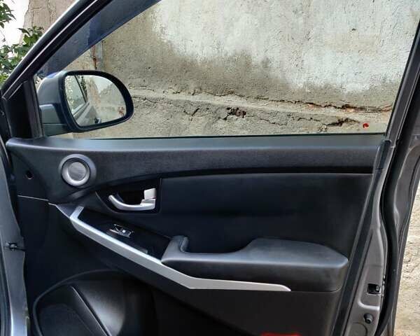Сірий Cанг Йонг Korando, об'ємом двигуна 2 л та пробігом 179 тис. км за 9000 $, фото 13 на Automoto.ua