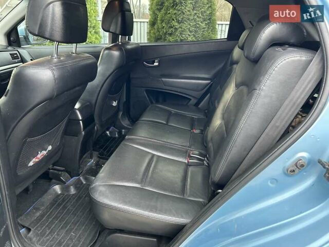 Синій Cанг Йонг Korando, об'ємом двигуна 2 л та пробігом 190 тис. км за 7900 $, фото 9 на Automoto.ua