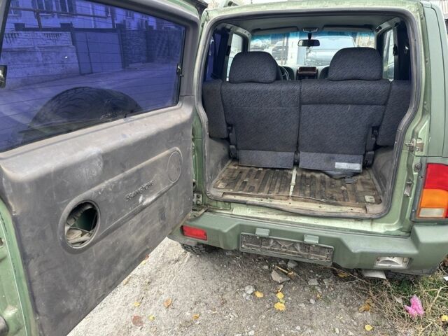 Зелений Cанг Йонг Korando, об'ємом двигуна 2.9 л та пробігом 1 тис. км за 953 $, фото 11 на Automoto.ua