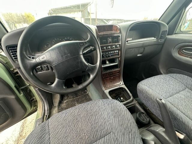 Зелений Cанг Йонг Korando, об'ємом двигуна 2.9 л та пробігом 1 тис. км за 953 $, фото 8 на Automoto.ua