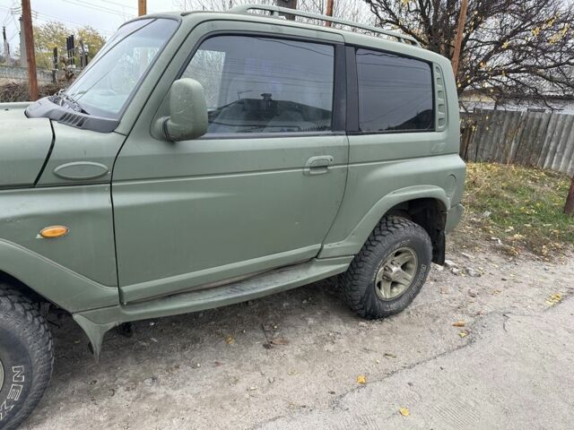 Зелений Cанг Йонг Korando, об'ємом двигуна 2.9 л та пробігом 1 тис. км за 953 $, фото 3 на Automoto.ua