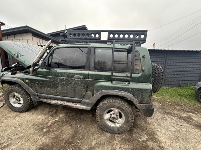 Зелений Cанг Йонг Korando, об'ємом двигуна 2.9 л та пробігом 1000 тис. км за 2500 $, фото 2 на Automoto.ua