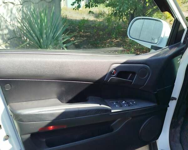 Cанг Йонг Кирон 2012 в Днепре (Днепропетровске) на Automoto.ua Белый Cанг Йонг Кирон, объемом двигателя 2 л и пробегом 183 тыс. км за 8500 $, фото 5 на Automoto.ua