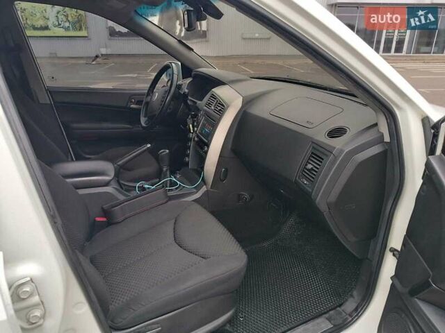 Белый Cанг Йонг Кирон, объемом двигателя 2 л и пробегом 150 тыс. км за 8000 $, фото 23 на Automoto.ua
