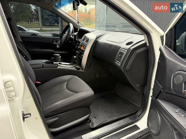 Белый Cанг Йонг Кирон, объемом двигателя 2 л и пробегом 180 тыс. км за 9500 $, фото 28 на Automoto.ua