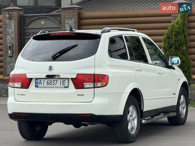 Білий Cанг Йонг Kyron, об'ємом двигуна 2 л та пробігом 300 тис. км за 7500 $, фото 23 на Automoto.ua