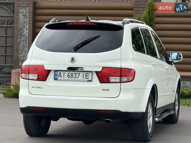 Білий Cанг Йонг Kyron, об'ємом двигуна 2 л та пробігом 300 тис. км за 7500 $, фото 21 на Automoto.ua