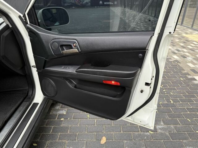 Cанг Йонг Kyron 2014 у Києві на Automoto.ua Білий Cанг Йонг Kyron, об'ємом двигуна 2 л та пробігом 180 тис. км за 9500 $, фото 21 на Automoto.ua