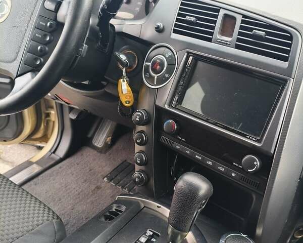 Бежевый Cанг Йонг Кирон, объемом двигателя 2 л и пробегом 221 тыс. км за 7500 $, фото 20 на Automoto.ua