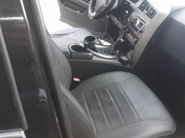 Чорний Cанг Йонг Kyron, об'ємом двигуна 2 л та пробігом 260 тис. км за 8000 $, фото 7 на Automoto.ua