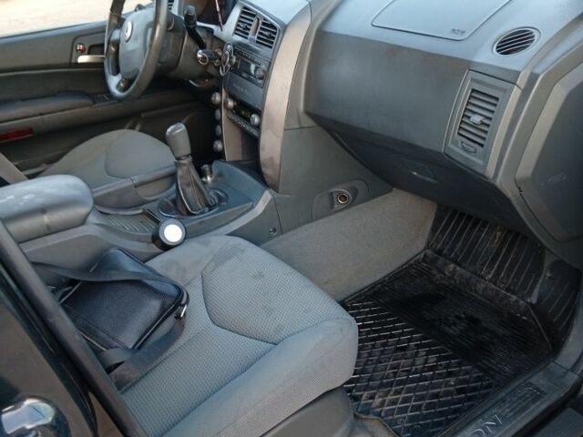 Чорний Cанг Йонг Kyron, об'ємом двигуна 2 л та пробігом 190 тис. км за 3600 $, фото 7 на Automoto.ua