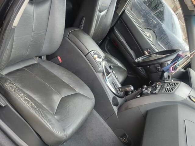 Черный Cанг Йонг Кирон, объемом двигателя 2 л и пробегом 221 тыс. км за 3500 $, фото 5 на Automoto.ua